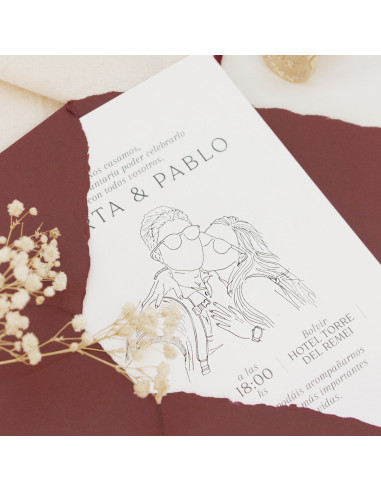 invitación de boda con una ilustración de los novios hecha a mano