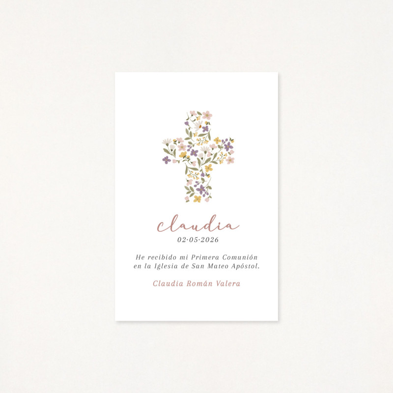 Recordatorio de primera comunión con una cruz floral como protagonista