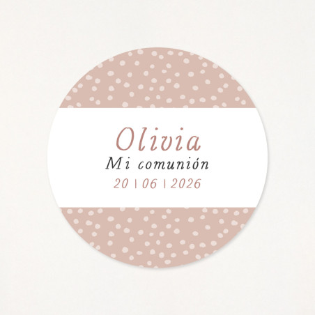 Adhesivo circular de 6cm, con un estampado de puntitos rosa, personalizado con el nombre y la fecha de su primera comunión