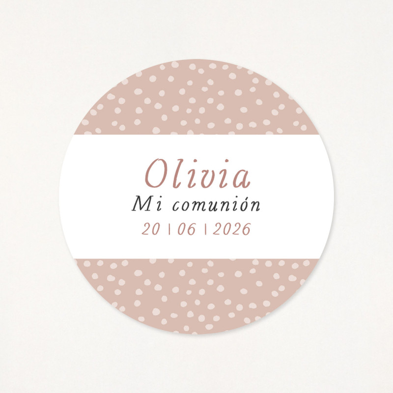 Adhesiu circular de 6cm, amb un estampat de puntets rosa, personalitzat amb el seu nom i la data de la primera comunió