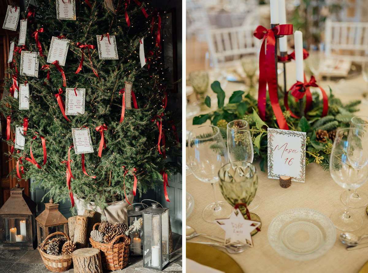 Decoración navideña en boda de invierno con centros de abeto, velas blancas y lazos de terciopelo rojo
